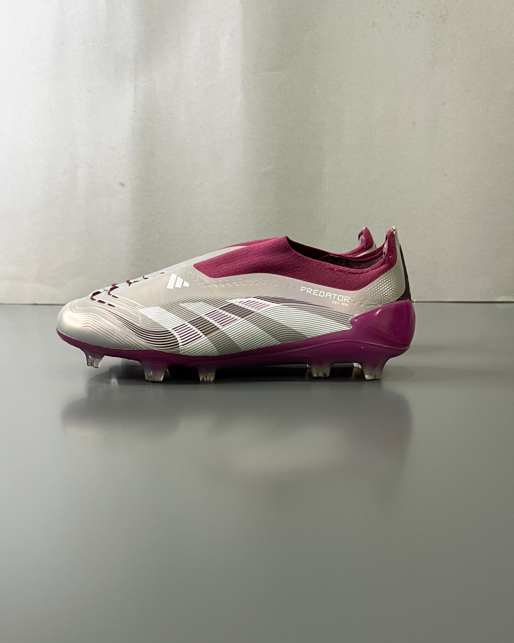 Predators silver laceless football cleats 