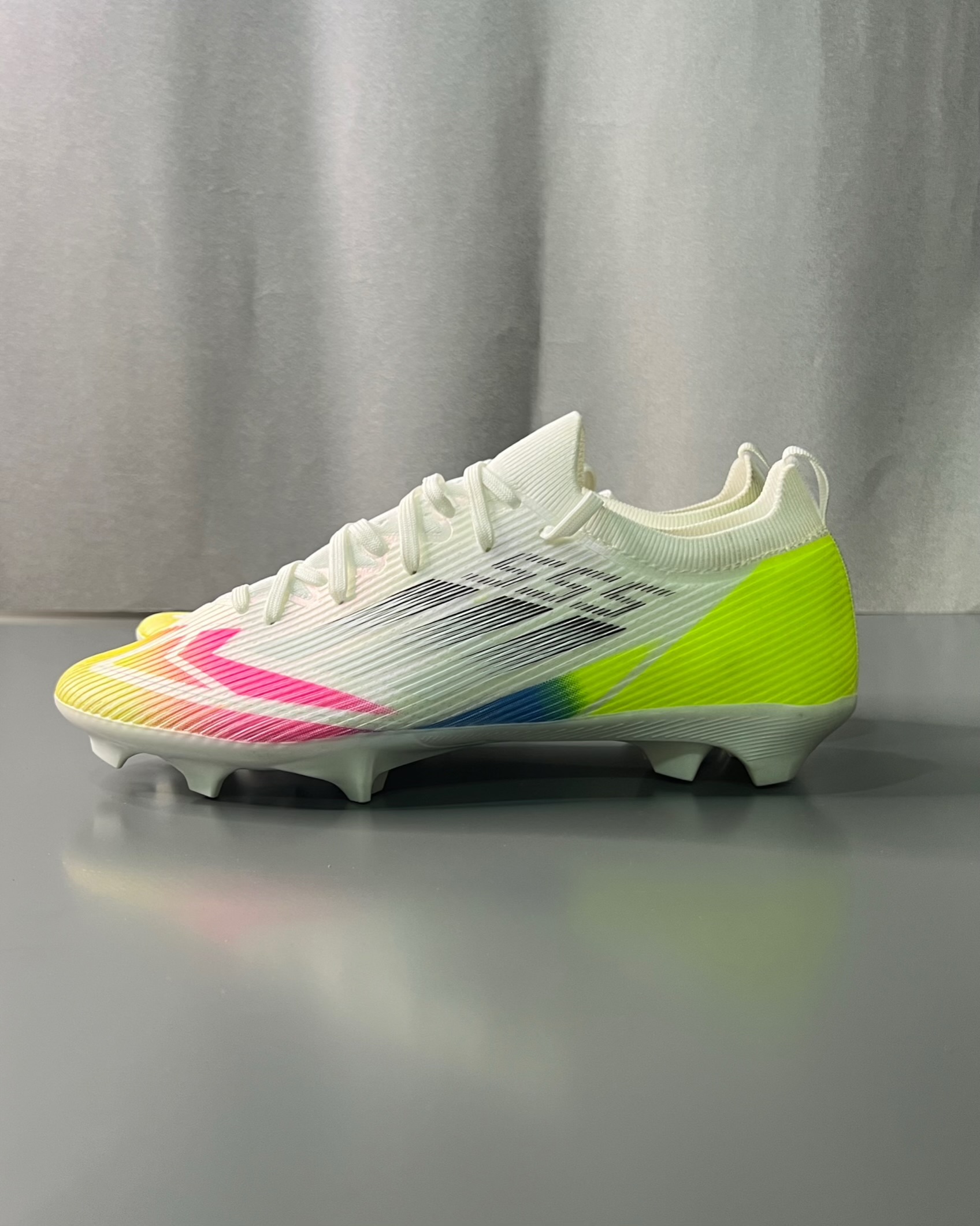 Anza football cleats f555 white green